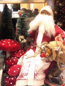 Santa Claus with Amanita muscaria mushrooms.